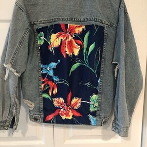 Denim jacket with embellishment on the back